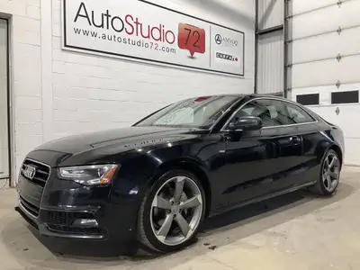 LAudi A5 S LINE AUTOMATIQUE CUIR TOIT MAGS AWD 2016 proposé par AutoStudio 72 à Mirabel se présente...