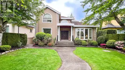 This quality-built 7-bedroom residence (4 up, 1 on the main, and 2 in the basement) offers a tastefu...