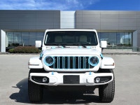 The 2024 Jeep Wrangler 4xe High Altitude 4 Door blends open-air freedom with plug-in hybrid power in... (image 6)