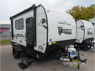 Forest River Viking ROK travel trailer 13000ROK highlights: 54in.in. x 74in.in. Flip-Up Bed Rear Hat...