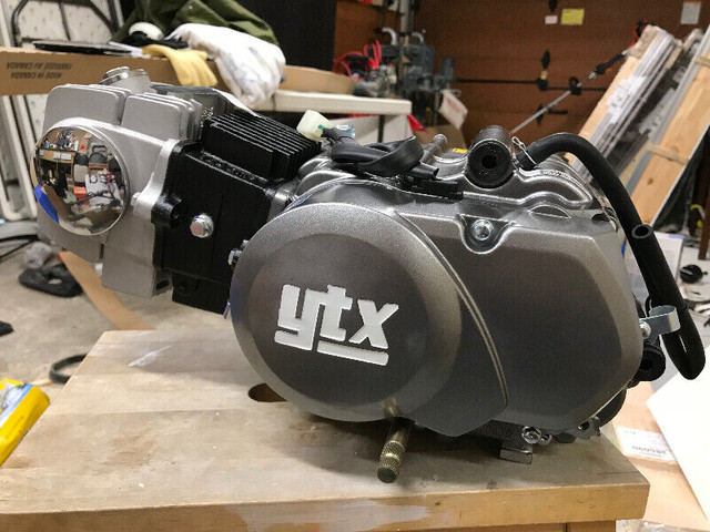 Moteur YTX 125cc manuel clutch 4 vitesses neuf dans la boite   . in Motorcycle Parts & Accessories in Laval / North Shore