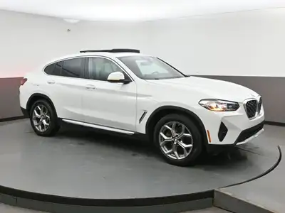 The BMW X4 xDrive30i delivers sporty performance and sleek coupe-inspired styling in a luxury SUV. W...