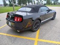 2010 Ford Mustang Convertible with V6 engine paired with a smooth-shifting 5 Speed manual transmissi... (image 4)