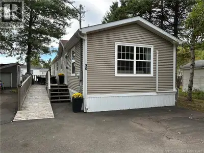 Beautiful, Wheel chair accessible minihome on OWNED LAND! You will love the location tucked back in...