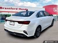 The 2024 Kia Forte EX, finished in striking Snow White Pearl, instantly elevates your daily commute... (image 5)
