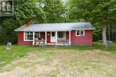 Discover the ultimate escape with this rare waterfront cottage nestled along the serene banks of the...