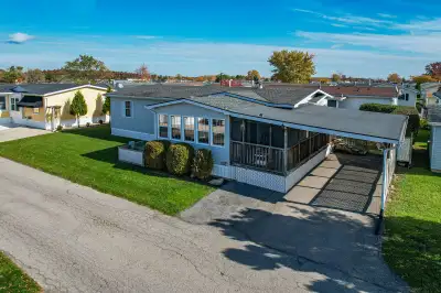 FOR SALE - 220 ROSEWOOD LANE AWAITS…This well-maintained 2-bedRm, 2-bath, 1545 sq ft bungalow on a D...