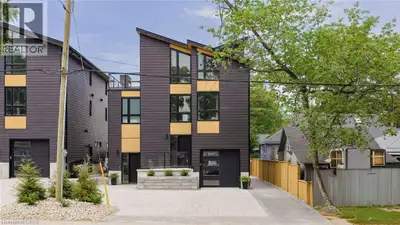 LOCATION...LOCATION...LOCATION!! Welcome to this breathtaking modern 3-storey home, nestled in the s...
