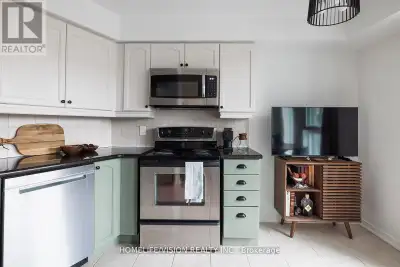 Welcome to this charming 1 bedroom plus den condominium, thoughtfully designed with an efficient lay...