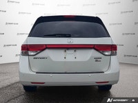 Simplify family journeys with the 2016 Honda Odyssey Touring. This white minivan, with 157,038 kilom... (image 5)