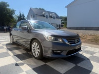 a refined midsize sedan. As an upper-tier trim, it features a leather-trimmed interior, heated front... (image 2)
