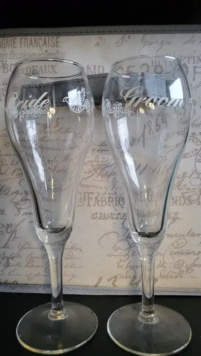 Beautiful pair of "Bride" and "Groom" $15 Both. champagne flutes. These are perfect for a wedding re...
