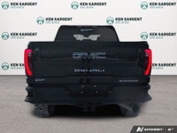 The 2026 GMC Sierra 3500HD Denali Ultimate is a commanding presence on any road. Decked out in a sle... (image 5)