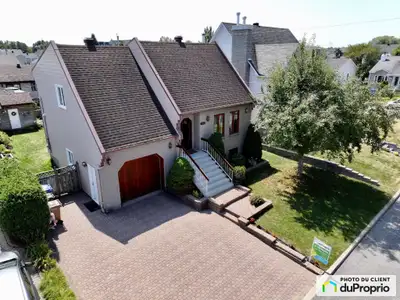 Élégant bungalow à Terrebonne Venez découvrir ce superbe bungalow construit en 1988, idéalement situ...