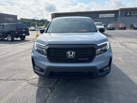 Command the road in this striking 2022 Honda Ridgeline Black Edition, equipped with a practical hard... (image 1)