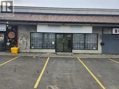 Retail unit in a small strip plaza available for lease on busy Barton Street in Hamilton. Features i...