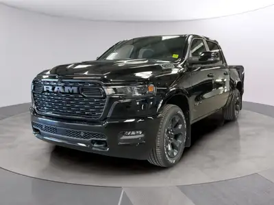 The 2026 Ram 1500 Big Horn 4x4 Crew Cab 57 Box comes in a striking Diamond Black Crystal Pearl finis...