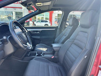 This 2021 Honda CR-V Sport, boasting a vibrant Radiant Red Metallic exterior and a sleek black inter... (image 5)