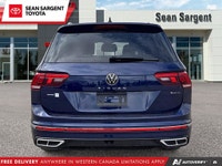 Experience refined driving with the 2024 Volkswagen Tiguan SE R-Line Black, now available at Sean Sa... (image 5)
