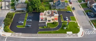 Prime commercial opportunity with excellent exposure on Dundas Street and quick access to Highway 40...