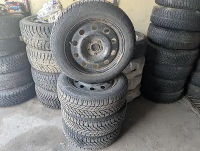 235 55R17 GOODYEAR ALTRAGRIP SNOW TIRES STUDDED, GREAT CONDITION, SET OF 4 RIMS AND TIRES ON 5 BOLT....