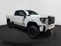 Welcome to Capital GMC! *This 2026 GMC Sierra AT4 2500HD Capital Custom Lifted Truck in Summit White... (image 6)