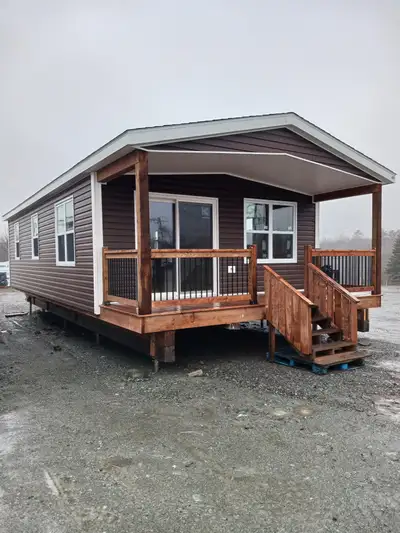 Check out this newly completed MicroHome shell! 18'x34' plus 6' deck, Vinyl siding, Shingled roof, 2...