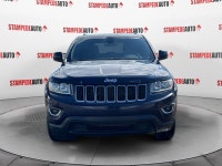 This outstanding example of a 2015 Jeep Grand Cherokee Laredo is offered by Stampede Auto. The Jeep... (image 7)