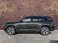 Only 10,972 Miles! This Jeep Grand Cherokee 4xe has a dependable Intercooled Turbo Gas/Electric I-4... (image 1)