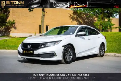 2021 Honda Civic EX finished in White delivers sporty styling, proven reliability, and modern techno...