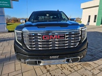 2023 GMC Sierra 1500 Denali 4x4 Crew, which boasts a low 83,769 km and the commanding presence of th... (image 1)