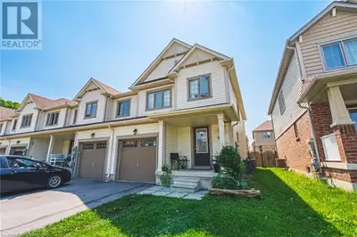 Welcome to this beautifully maintained end-unit townhouse, ideally located just 200 feet from scenic...