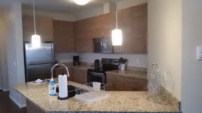 Beautiful FULLY Furnished Top Floor Unit - Available July 1