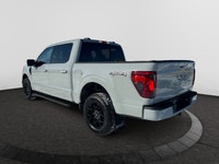 Check out this vehicle's pictures, features, options and specs, and let us know if you have any ques... (image 2)