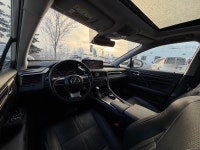 The RX 350 is defined by its "floating roofline" design and the signature Lexus spindle grille. With... (image 6)