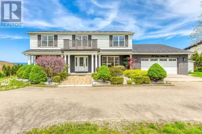 Nestled along the serene shores of Lake Ontario, this exceptional residence showcases panoramic, uno...