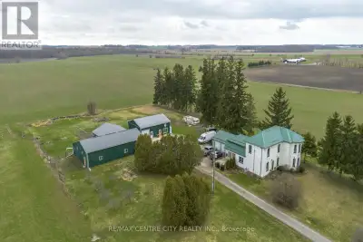 Welcome to this unique 5.5-acre country property offering a beautifully maintained farmhouse, versat...