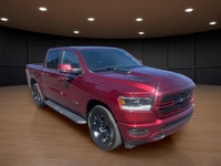 Introducing the stunning red 2023 Ram 1500 Sport 4x4 Crew Cab 5'7" Box, designed to handle the road... (image 3)