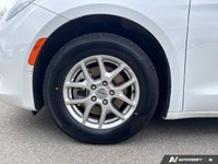 This Chrysler Grand Caravan boasts a Regular Unleaded V-6 3.6 L/220 engine powering this Automatic t... (image 8)