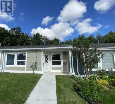 Welcome to a beautifully renovated 2-Bedroom plus Den Bungalow in the exclusive 55+ gated community...