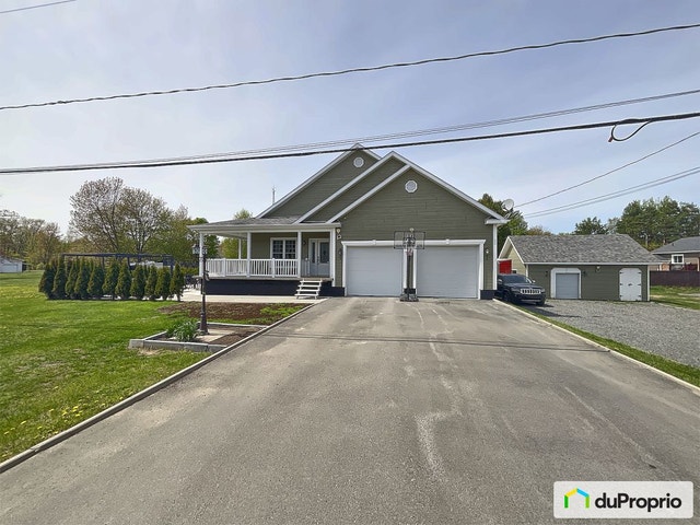 $598,000 - Bungalow for sale in St-Boniface — photo 1