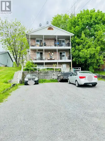 Discover this meticulously maintained TRIPLEX in Belleville's coveted location. Each unit features 2...