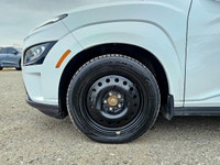 Welcome to a new era of driving with the 2023 Hyundai Kona Electric Ultimate in a pristine white fin... (image 3)