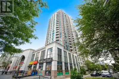 Welcome to this bright and beautifully updated 1+Den suite at the highly sought-after 7 Lorraine Dri...