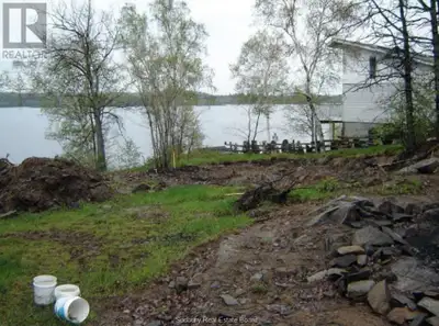 Discover the perfect canvas for your dream home on this stunning waterfront lot on Whitewater Lake....