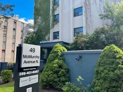 Fully renovated spacious suite features kitchen with modern features and finishes including laminate...