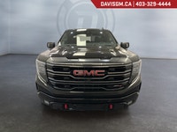 The 2024 GMC Sierra 1500 AT4 Crew Cab Short Box 4WDblends premium craftsmanship, rugged off-road cap... (image 1)