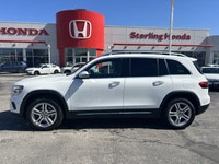 This 2023 Mercedes-Benz GLB 250 Sport Utility, presented in crisp Polar White, redefines compact lux... (image 8)