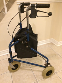 Walker With Large wheels and Basket in good condition