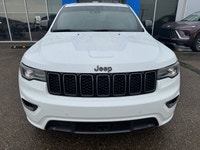 Our exclusive 2021 Jeep Grand Cherokee Limited 4X4 wraps assertive capability in a dramatic Bright W... (image 7)